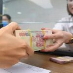 Cán bộ công an làm việc với người dân liên quan đến vụ án tài chính