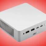 Asus Ascent QN10 đặt trên mặt bàn với thiết kế mini PC màu bạc