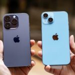 Hai mẫu iPhone 14 Pro và iPhone 14 được đặt cạnh nhau trong ảnh minh họa