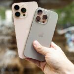 Một chiếc iPhone đặt trên nền tối, minh họa cho vụ dàn xếp liên quan đến các tính năng Siri
