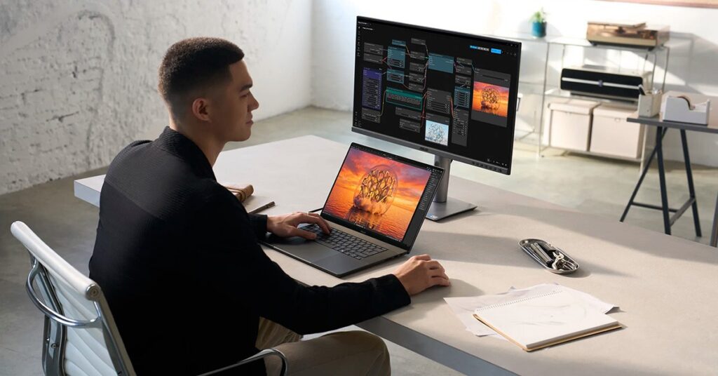 Laptop ASUS ProArt P16 RTX Spark với thiết kế màu trắng đặt trên bàn làm việc