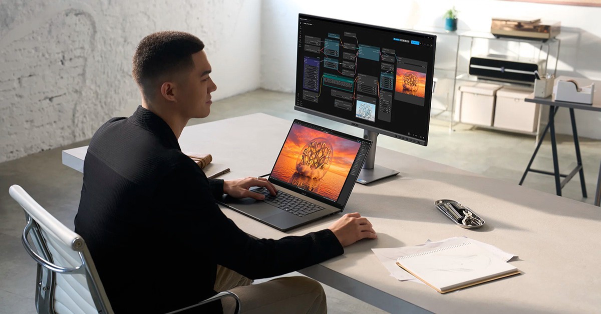 Laptop ASUS ProArt P16 RTX Spark với thiết kế màu trắng đặt trên bàn làm việc